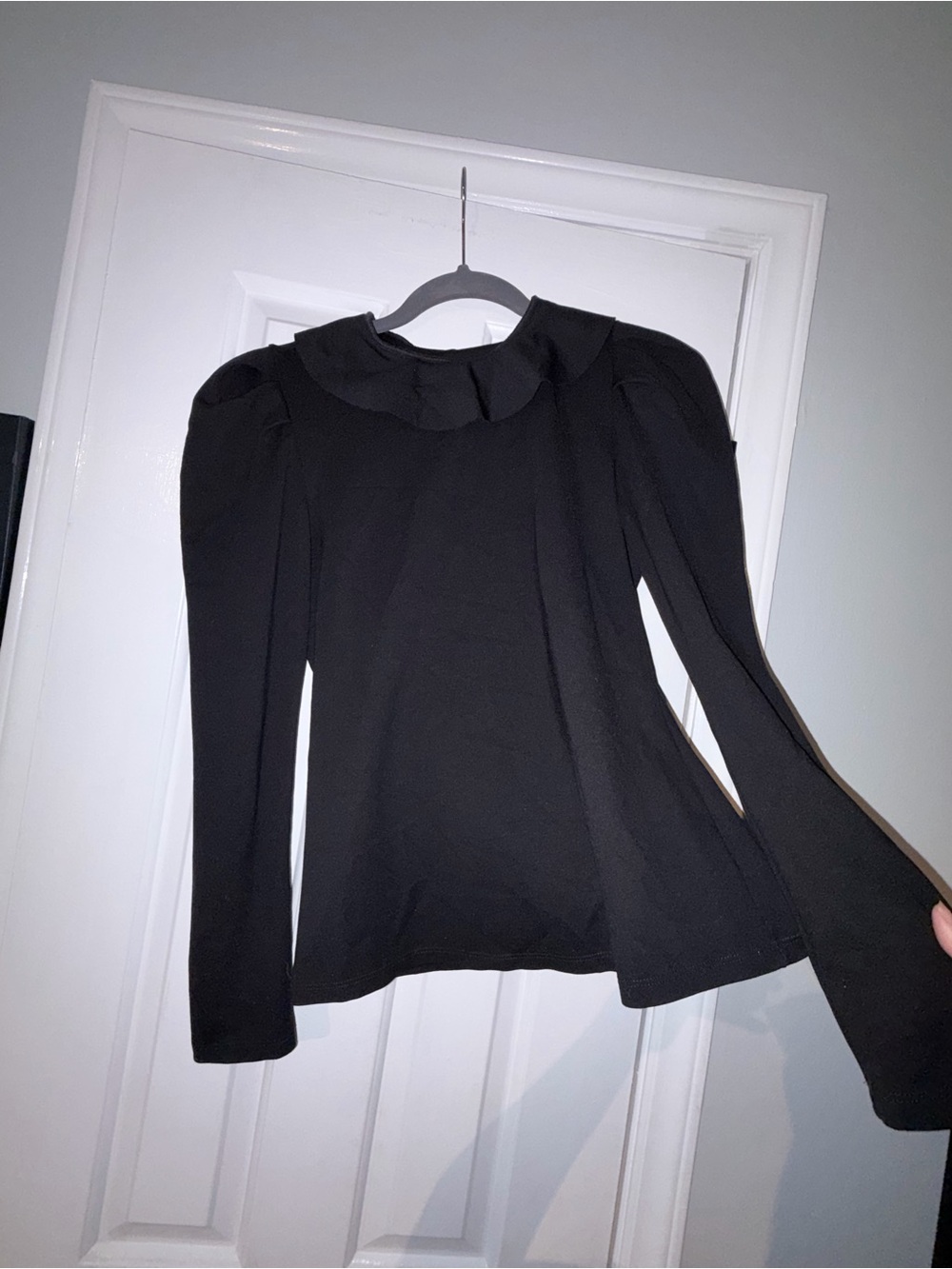 Elegant Black Long-Sleeve Blouse with Ruffled Collar